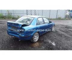 Dezmembrez Mazda 323 C IV